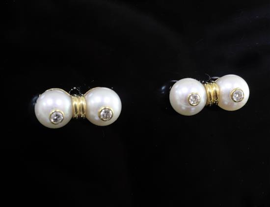 A pair of 18ct gold and diamond set twin cultured pearl ear studs.
